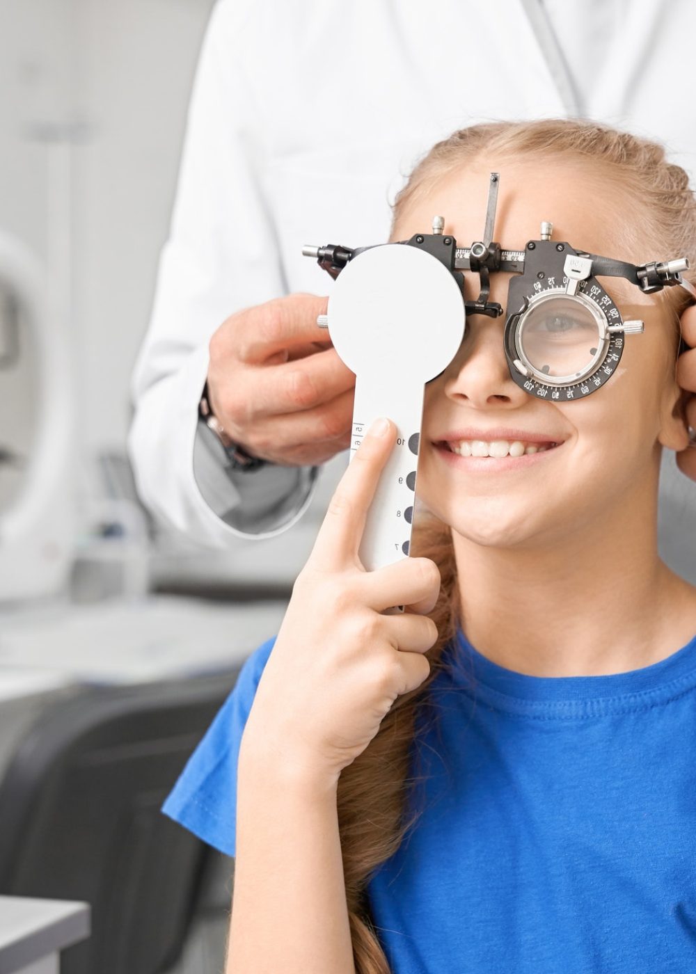 girl-in-glassses-looking-at-letters-and-checking-vision